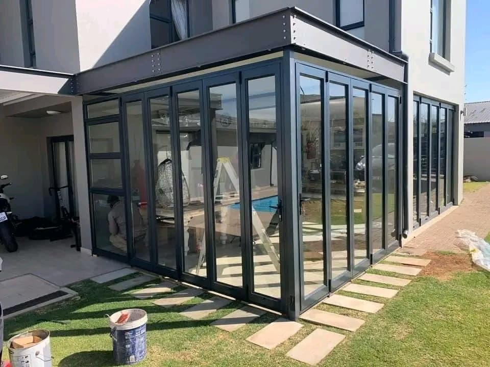 Aluminium stacking folding door enclosure installed at a Gauteng home